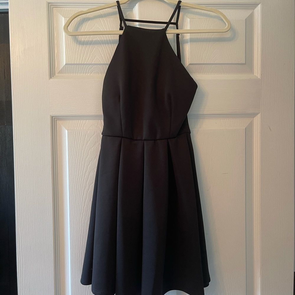 Backless black mini dress